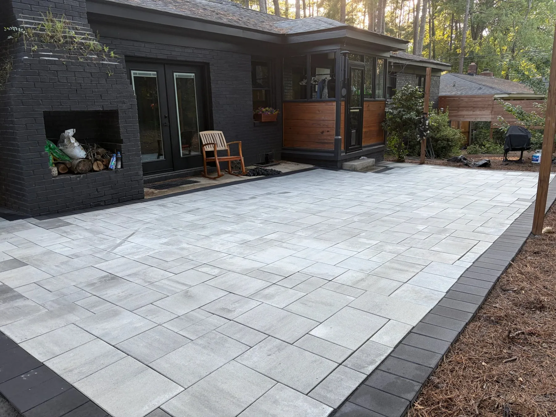 Paver patio with outdoor fireplace